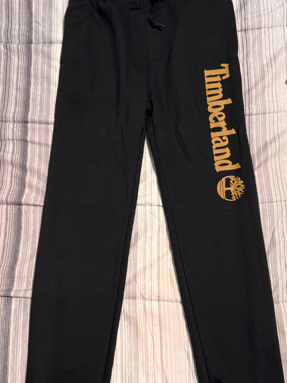 Timberland Black Joggers with Gold Logo Stripe
